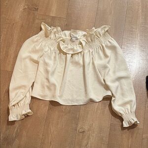 Diane Von Furstenberg off-shoulder top in size large